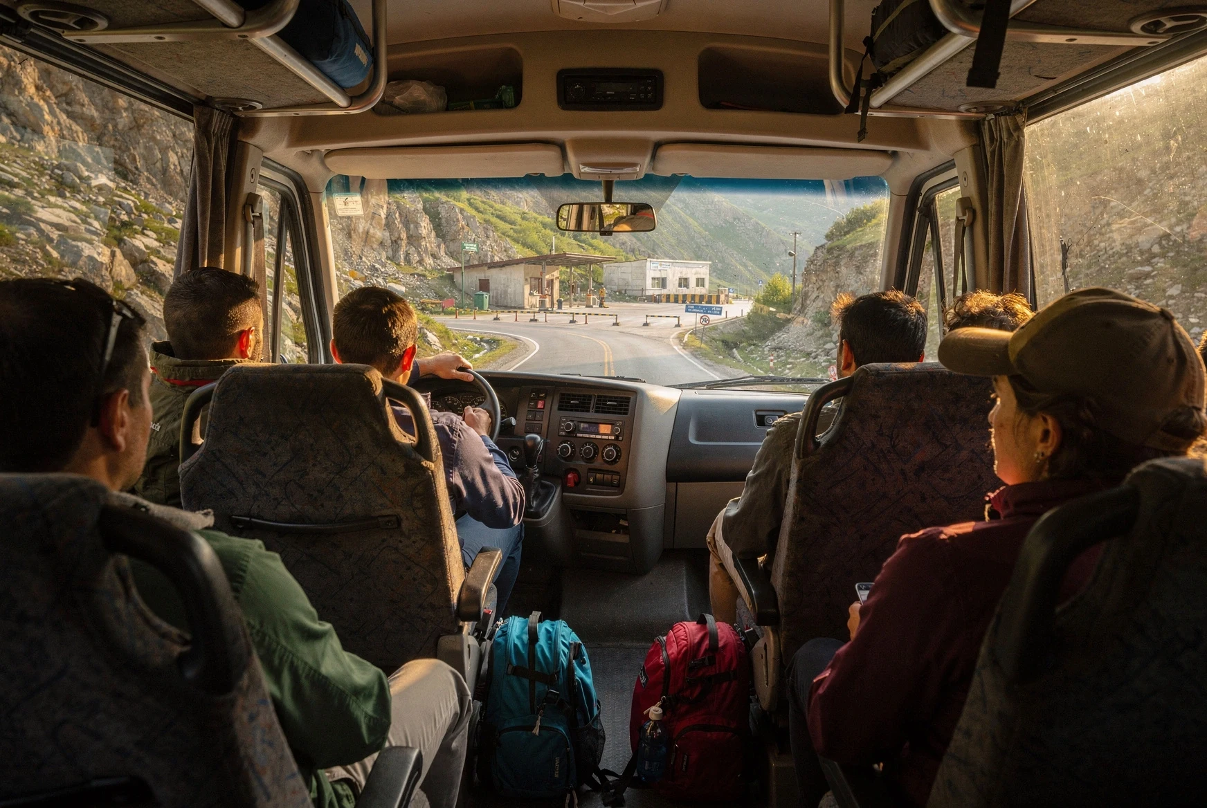 Interior of a shared minibus driving toward a Caucasus border route