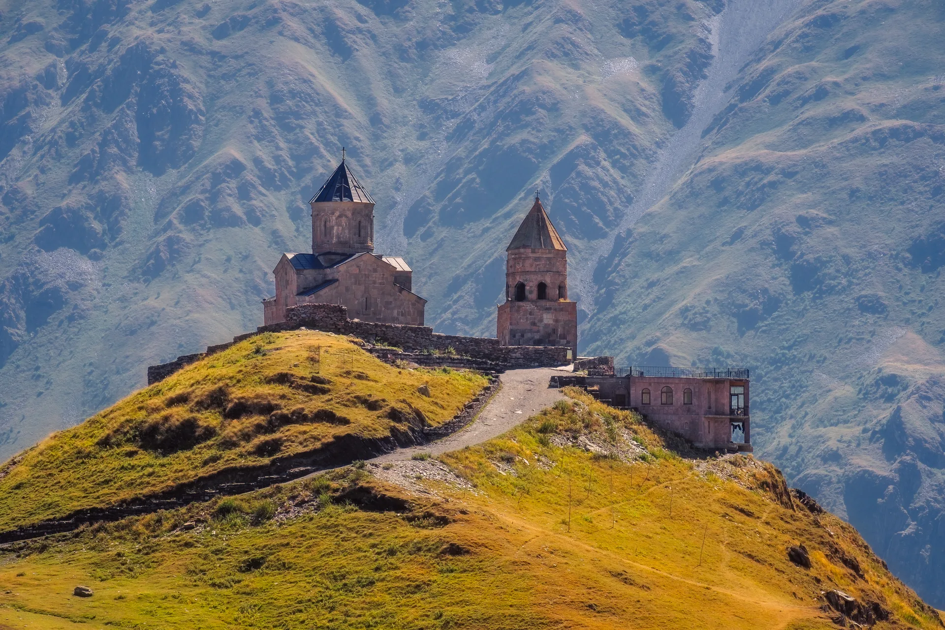 Gergeti Trinity Church with Mount Kazbek towering behind it